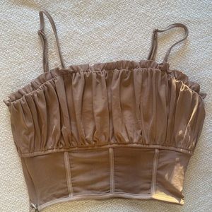 Small light brown top